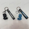 Trendy checkerboard cartoon bear figurine soft rubber keychain bear three-dimensional figurine pendant details Picture